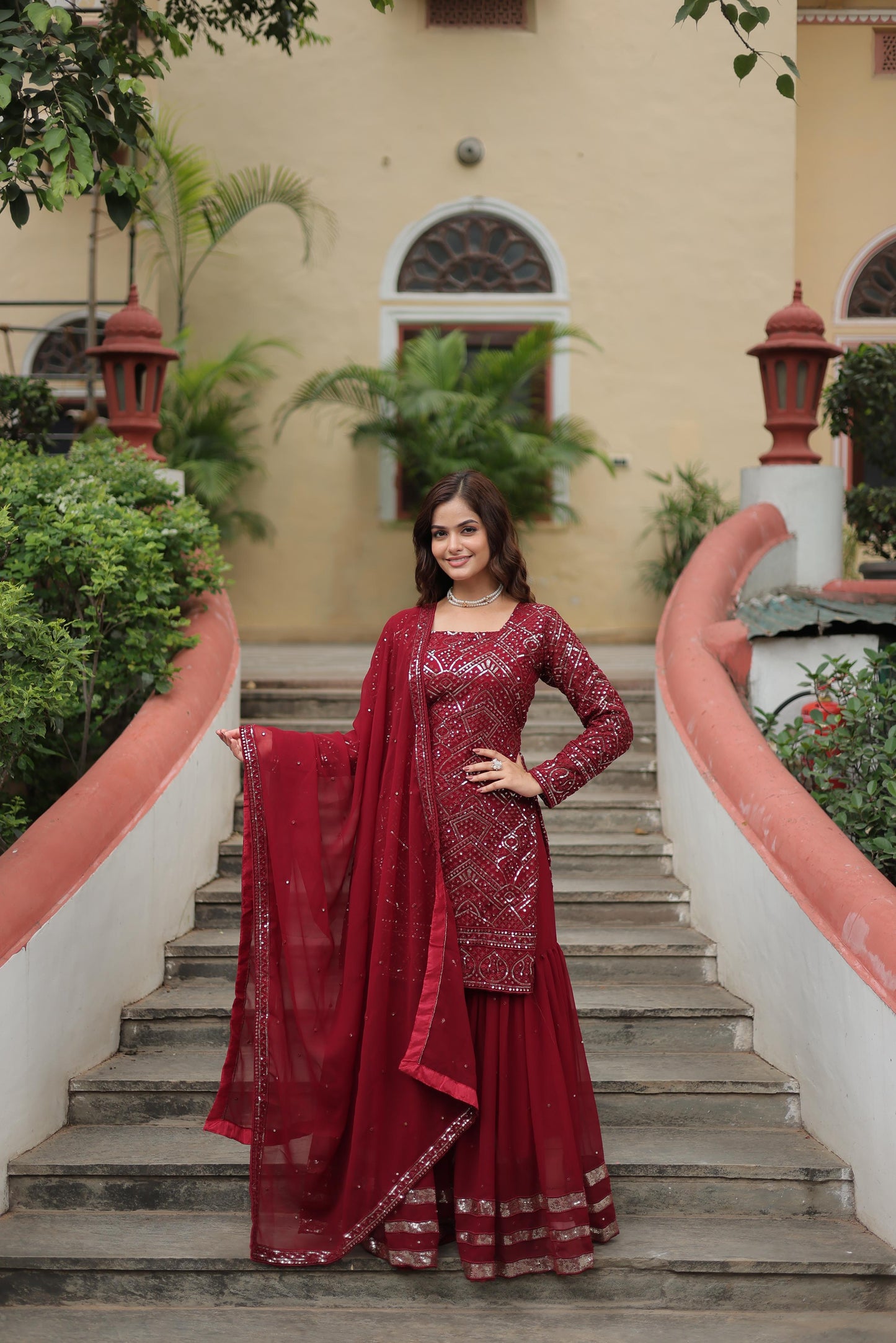 Party Wear Maroon Color Faux Georgette With Sequins And Thread Embroidered Work Beautiful Sharara Suit