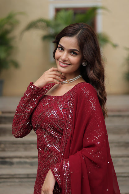 Party Wear Maroon Color Faux Georgette With Sequins And Thread Embroidered Work Beautiful Sharara Suit