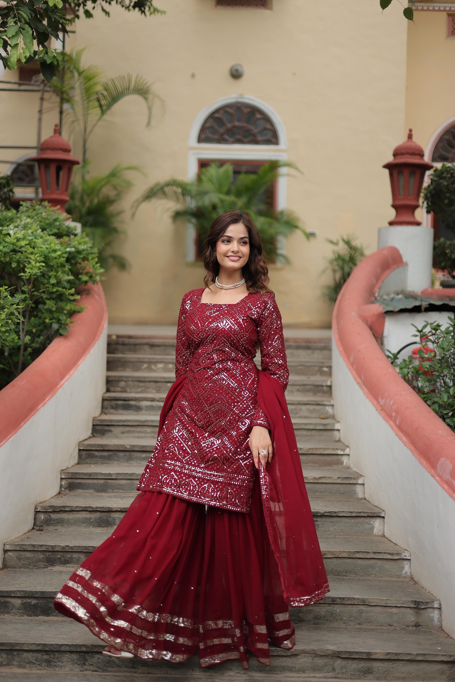 Party Wear Maroon Color Faux Georgette With Sequins And Thread Embroidered Work Beautiful Sharara Suit