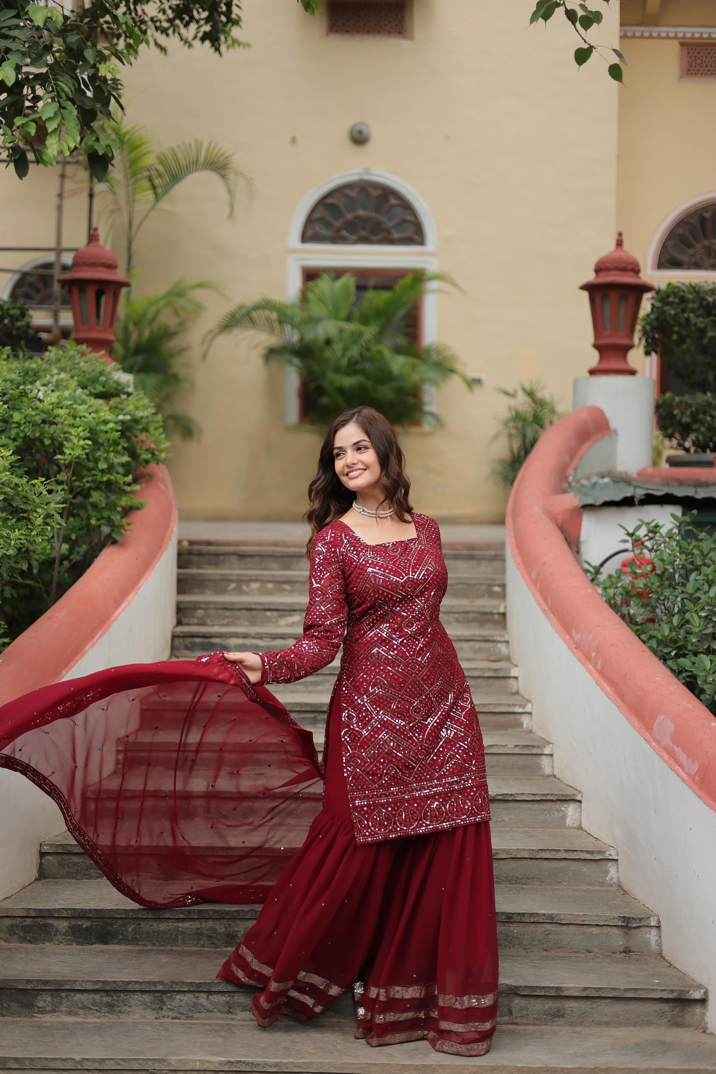 Party Wear Maroon Color Faux Georgette With Sequins And Thread Embroidered Work Beautiful Sharara Suit