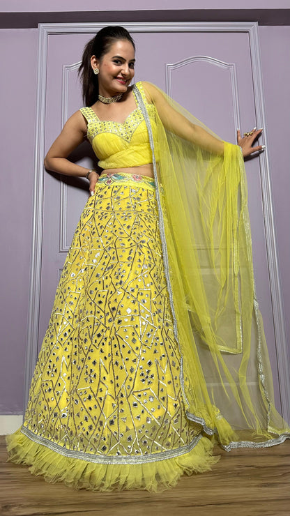 Haldi Wear Yellow Color Georgette Lehenga With Zari And Foil Paper Work And Net Ruffle Border Beautiful Lehenga Choli