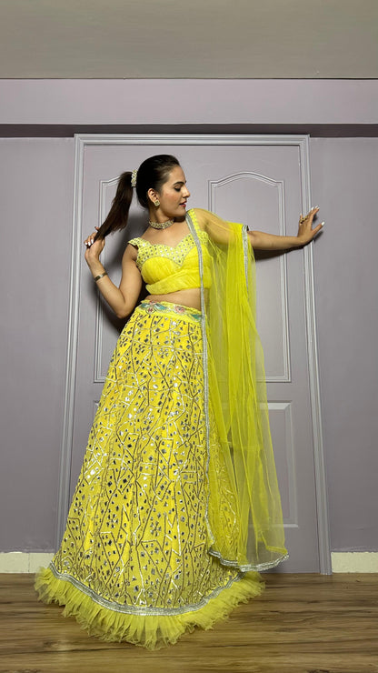 Haldi Wear Yellow Color Georgette Lehenga With Zari And Foil Paper Work And Net Ruffle Border Beautiful Lehenga Choli