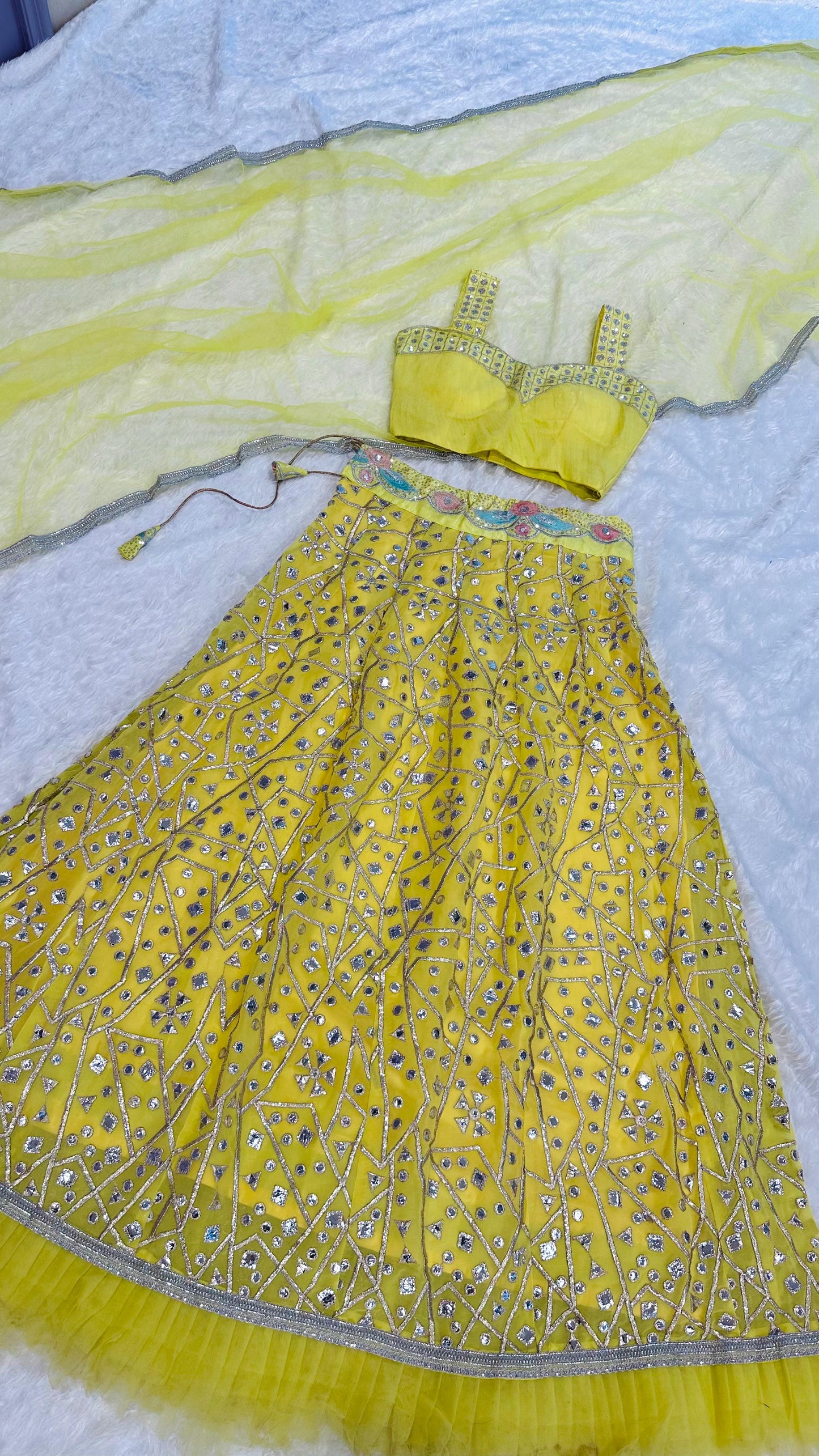Haldi Wear Yellow Color Georgette Lehenga With Zari And Foil Paper Work And Net Ruffle Border Beautiful Lehenga Choli