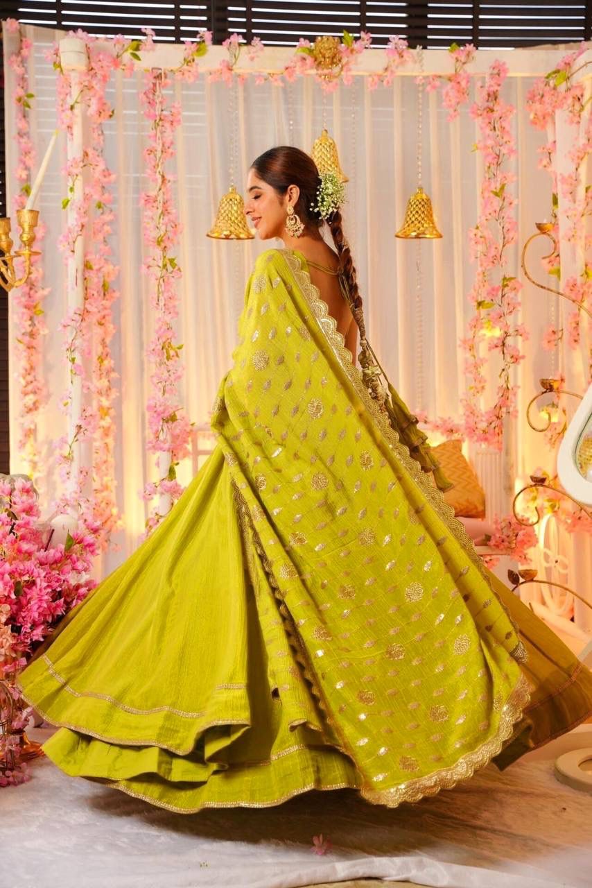 Glimmering Mustard Color Heavy Roman Silk With Fancy Lace Designer Gown