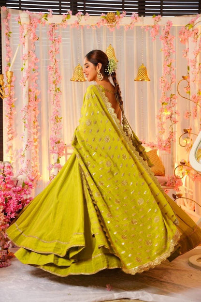 Glimmering Mustard Color Heavy Roman Silk With Fancy Lace Designer Gown