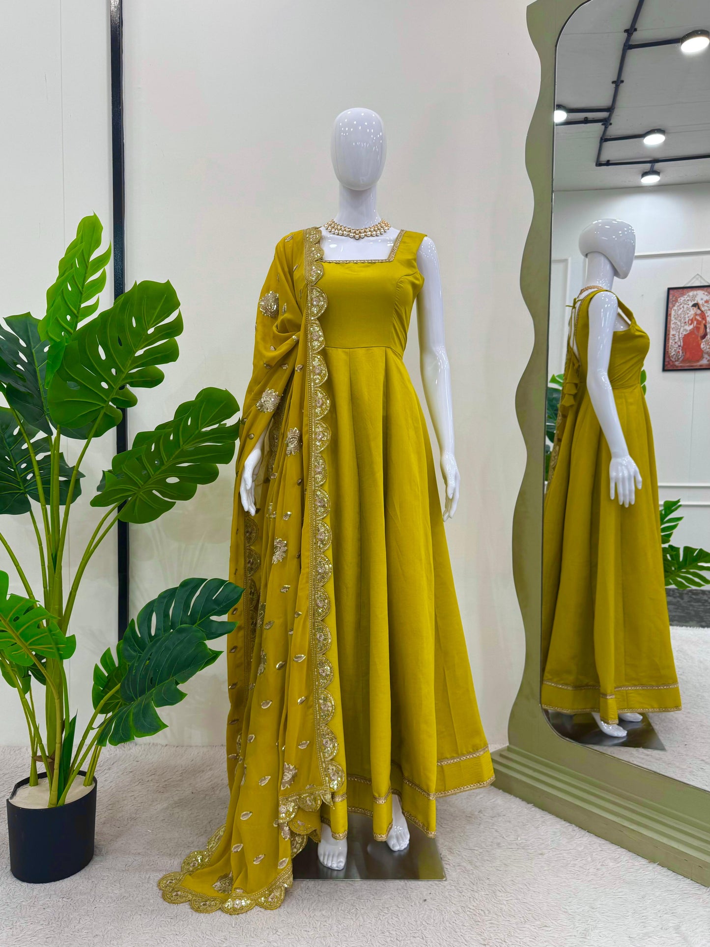 Glimmering Mustard Color Heavy Roman Silk With Fancy Lace Designer Gown