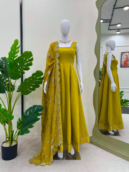 Glimmering Mustard Color Heavy Roman Silk With Fancy Lace Designer Gown