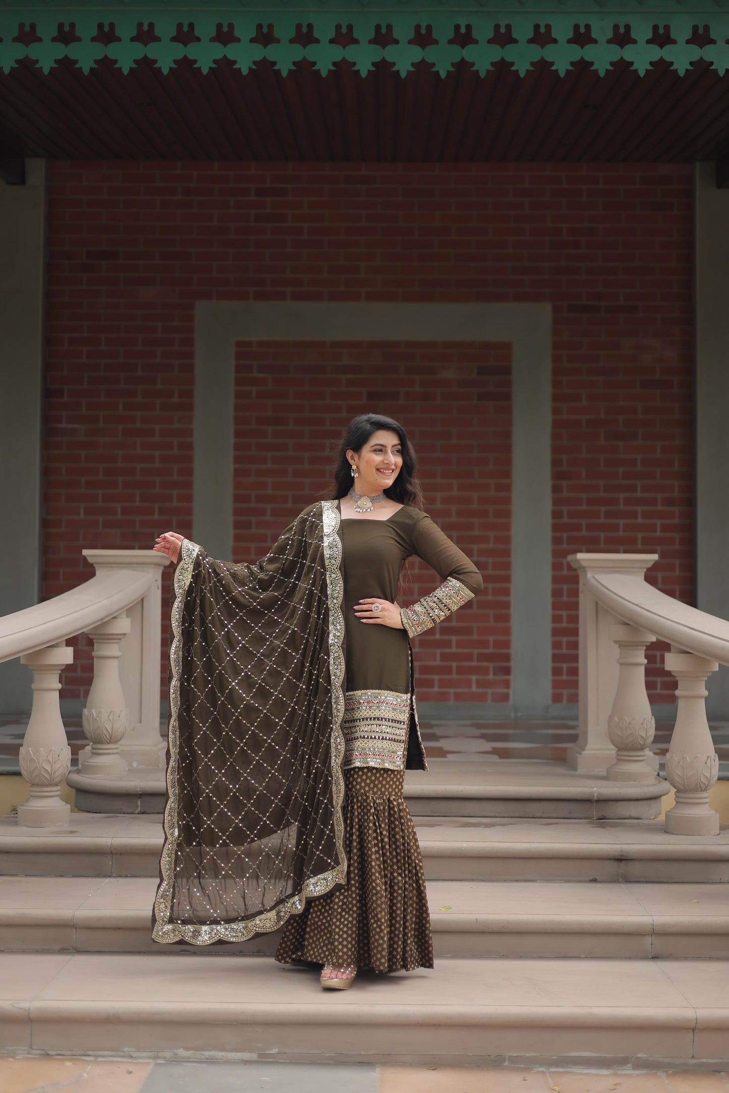 Wedding Wear Mahendi Green Color Faux Georgette With Sequins And Thread Embroidered Work Sharara Suit