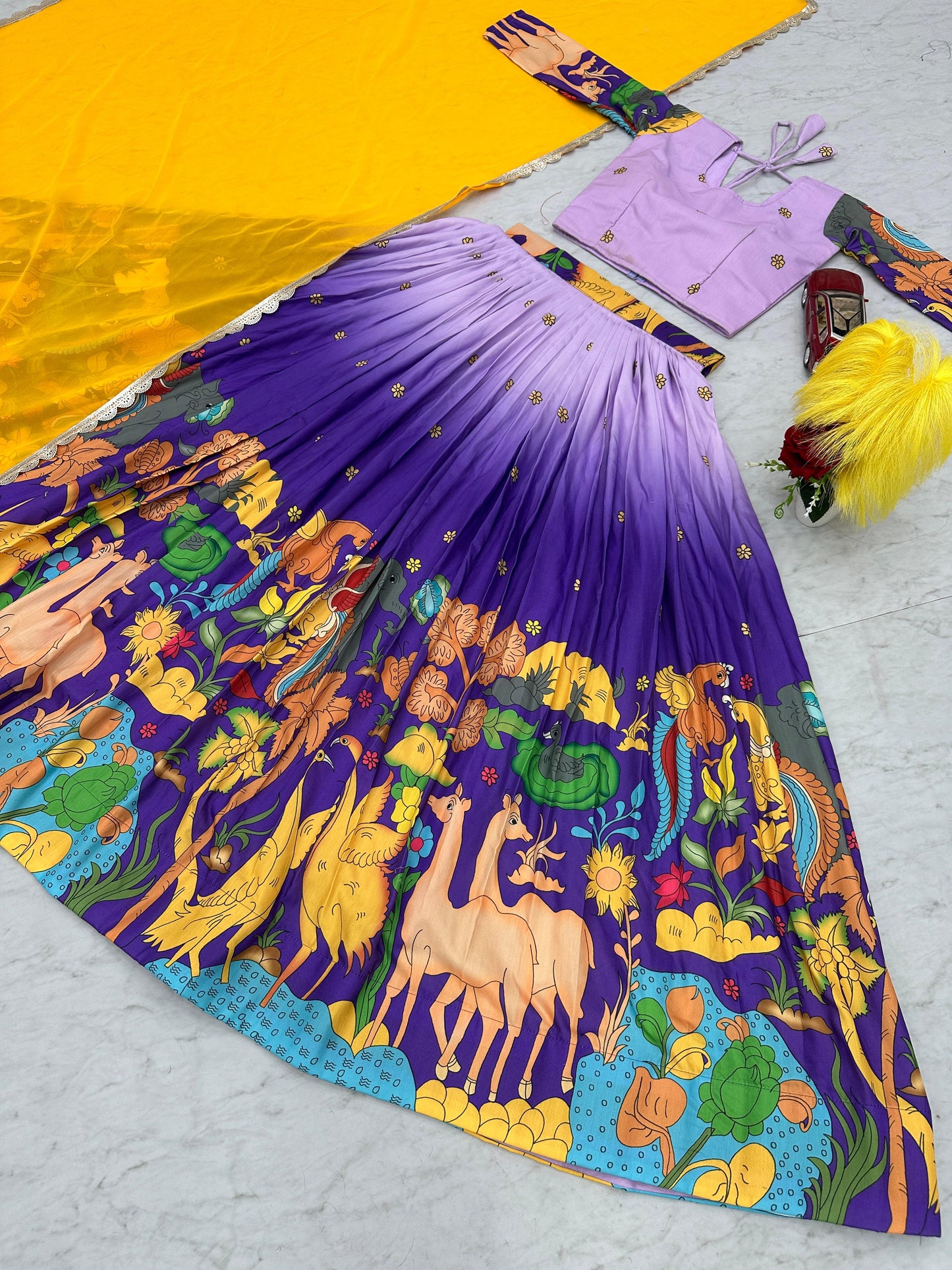 Glimmering Lavender And Blue Color Cotton With Kalamkari Printed Beautiful Lehenga Choli