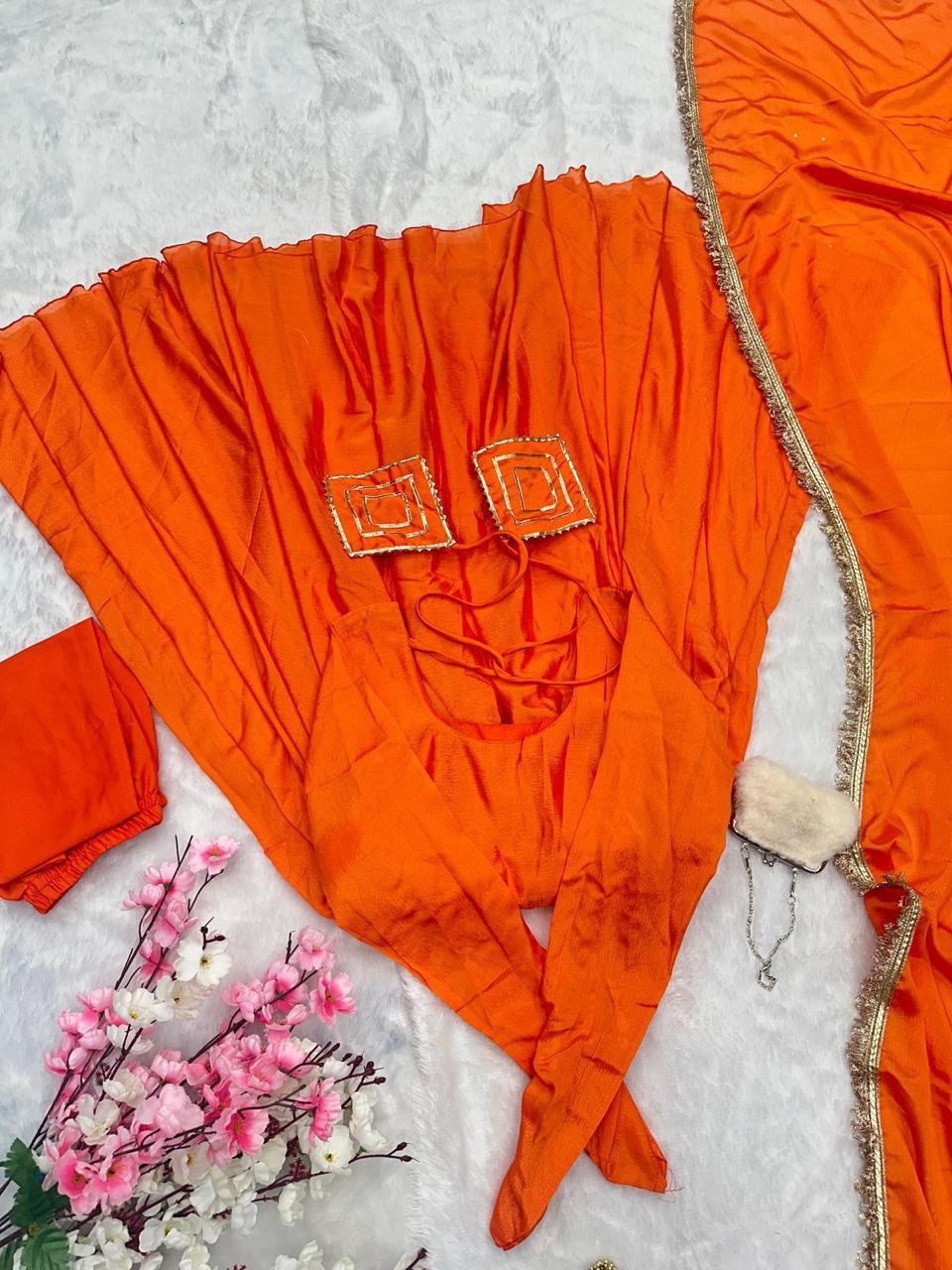 Peaceful Orange Color Chinnon Silk Anarkali Gown