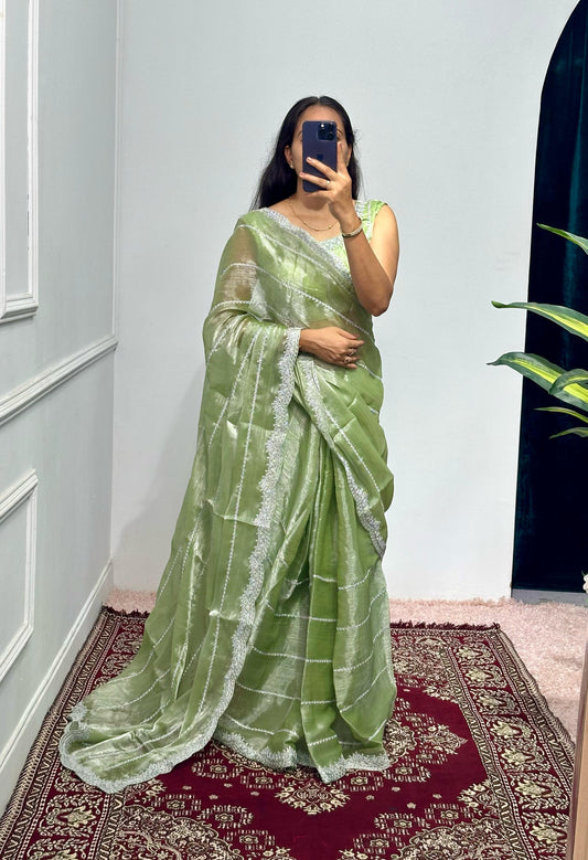 Peaceful Embroidery Zari Work Perrot Color Saree