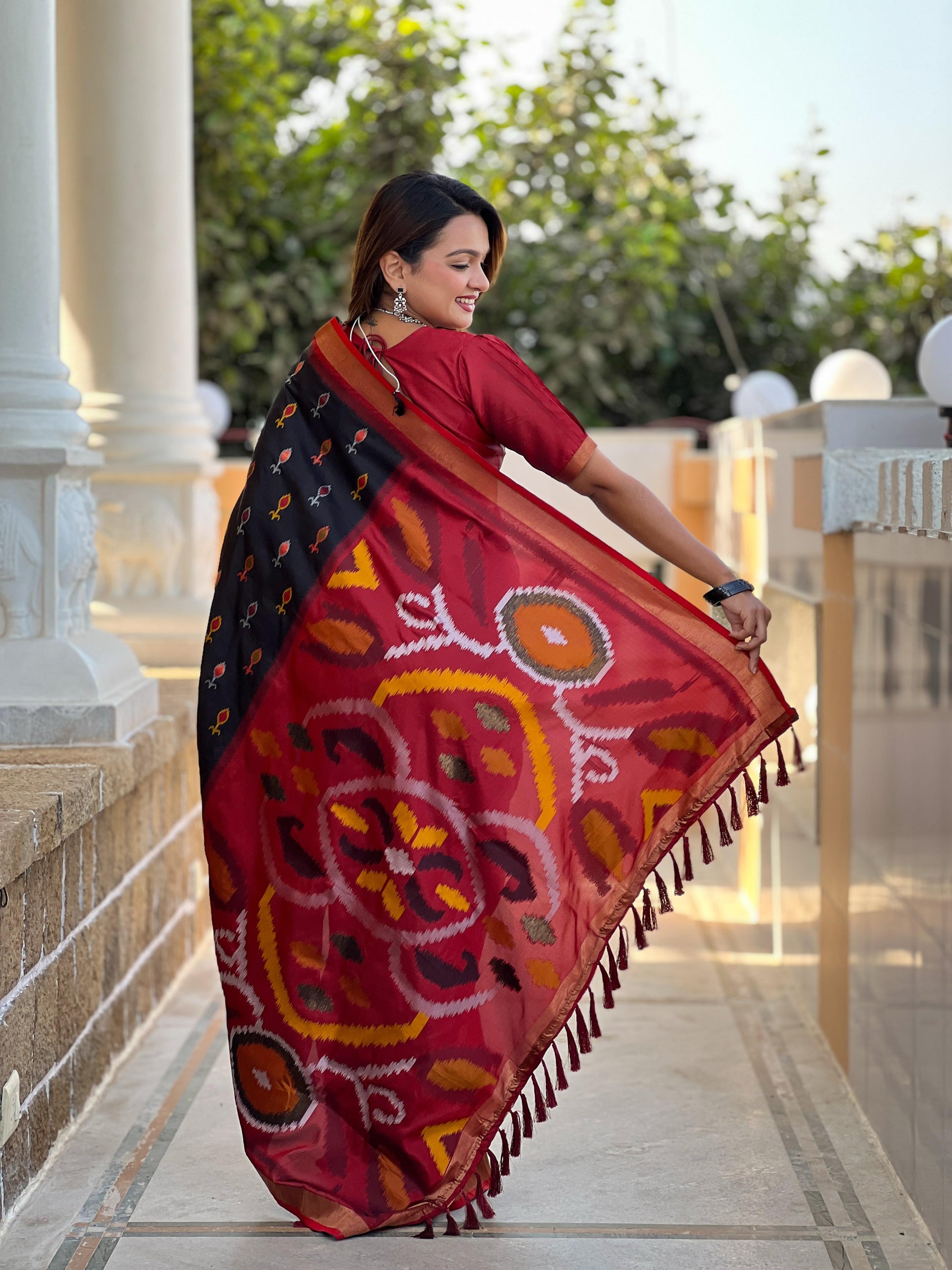 Black Color Patola Weaving Border Silk Saree