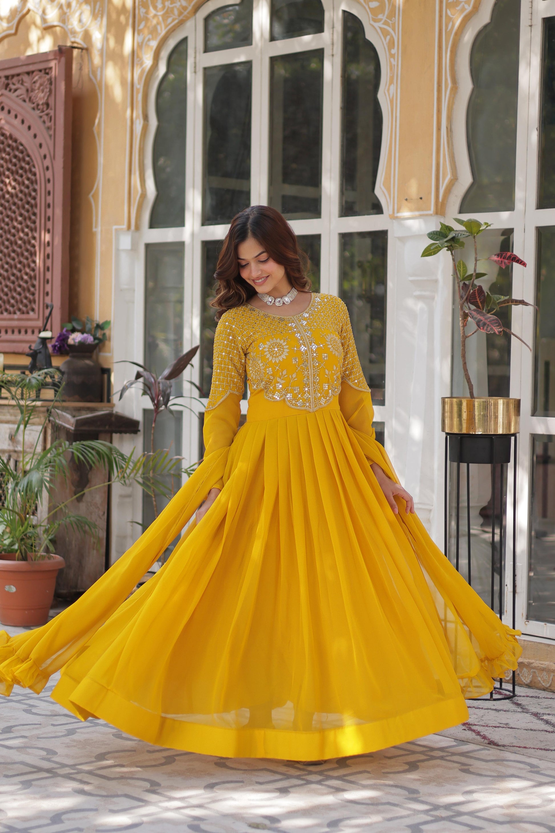 Stunning Georgette Embroidered Work Yellow Color Gown