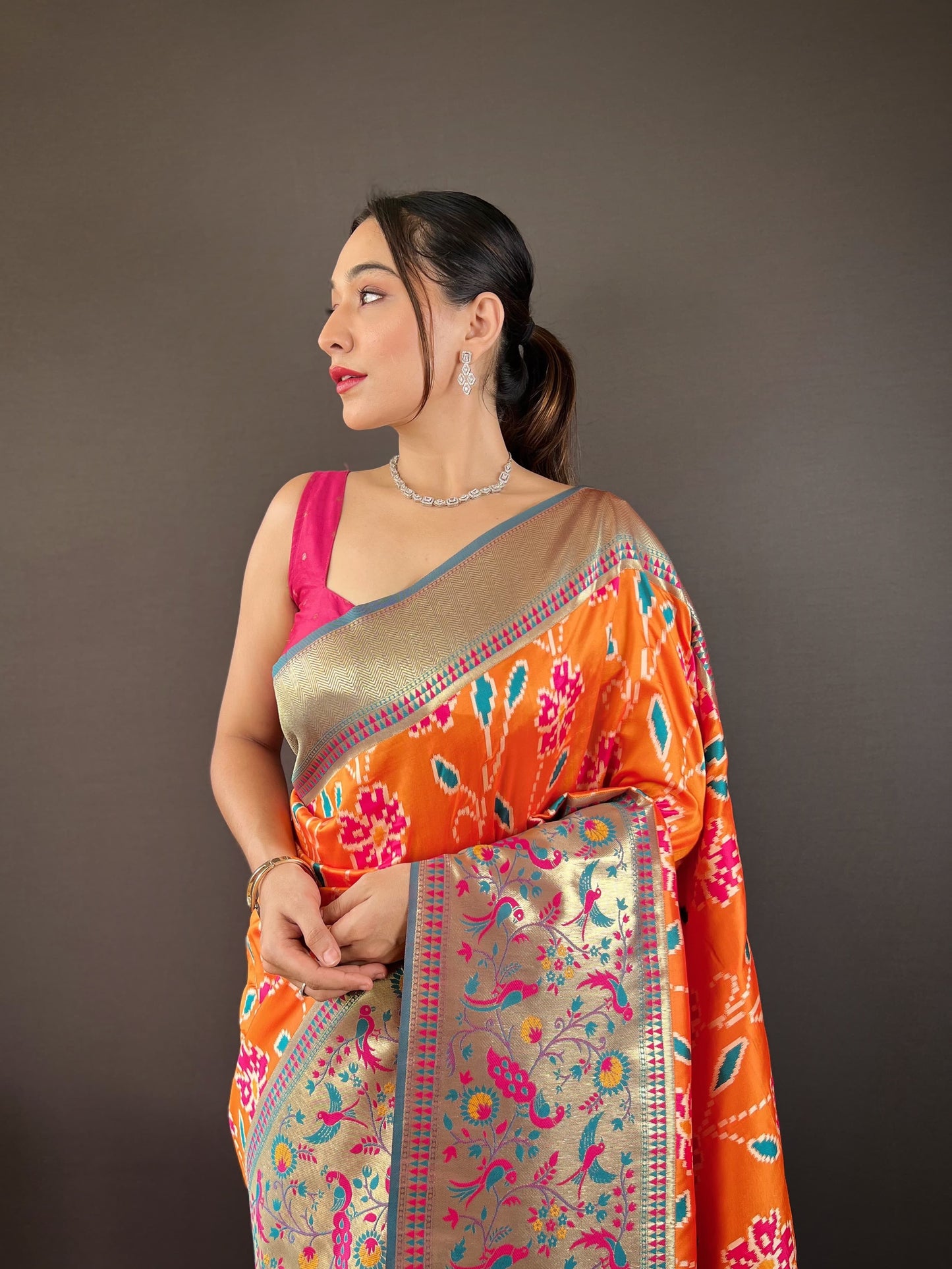 Adorable Silk Patola Weaving Orange Color Saree