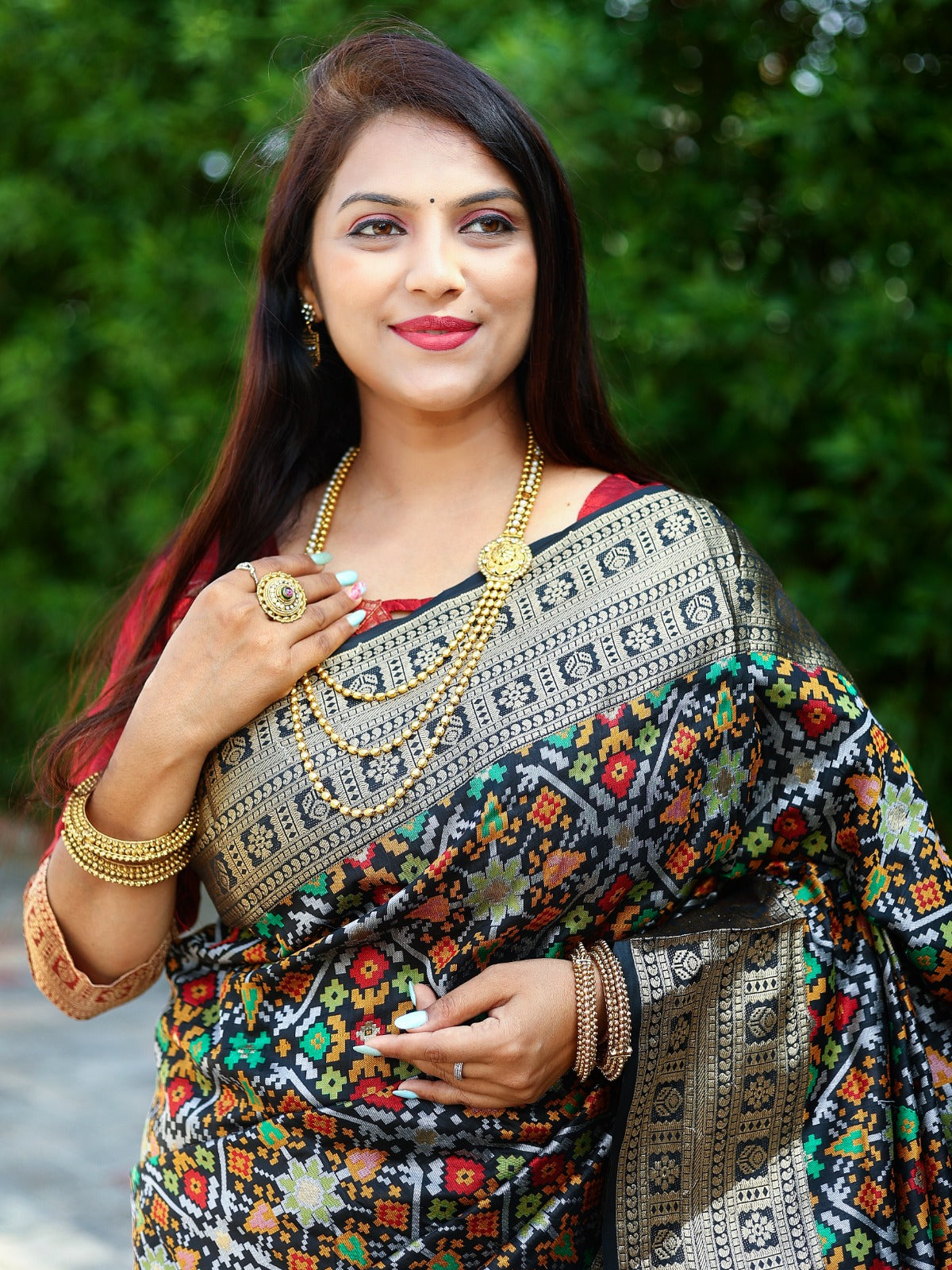 Fashionable Black Color All Over Zari Patola Weaving Saree