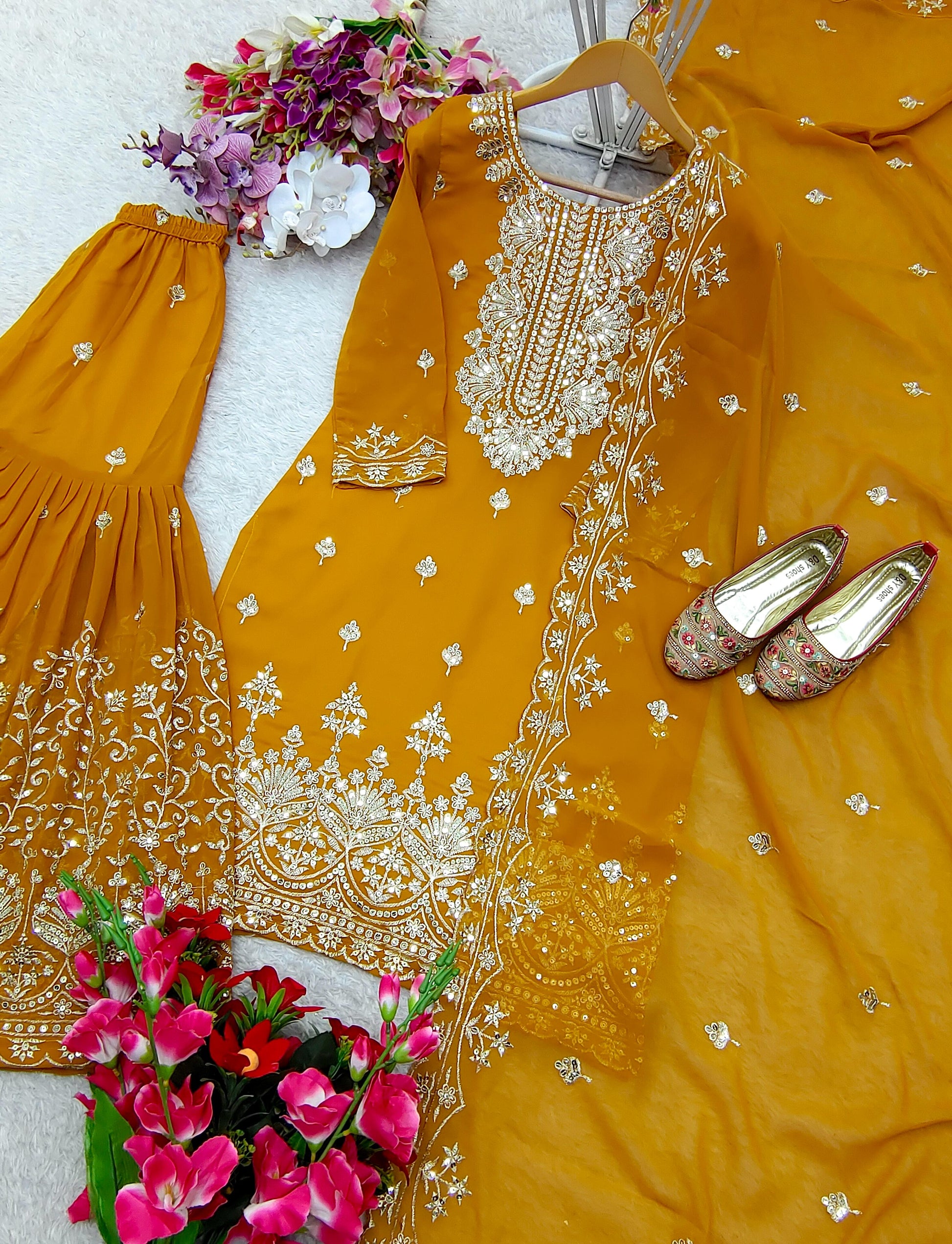 Charming Georgette Mustard Color Sharara Suit