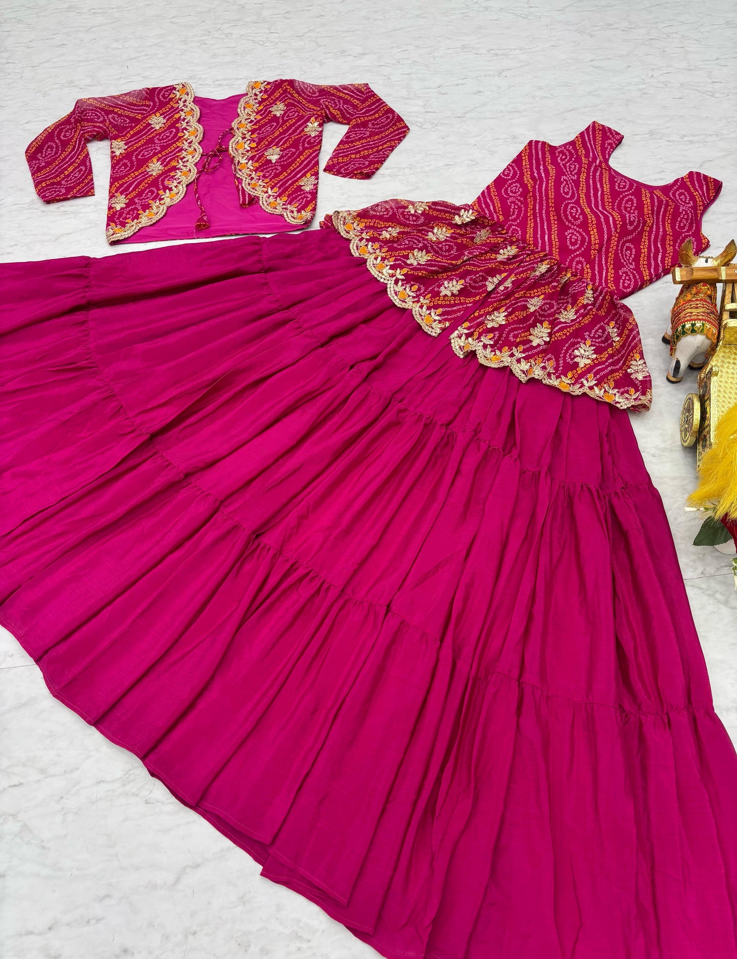 Charming Pink Color Bandhej Top With Lehenga With Koti