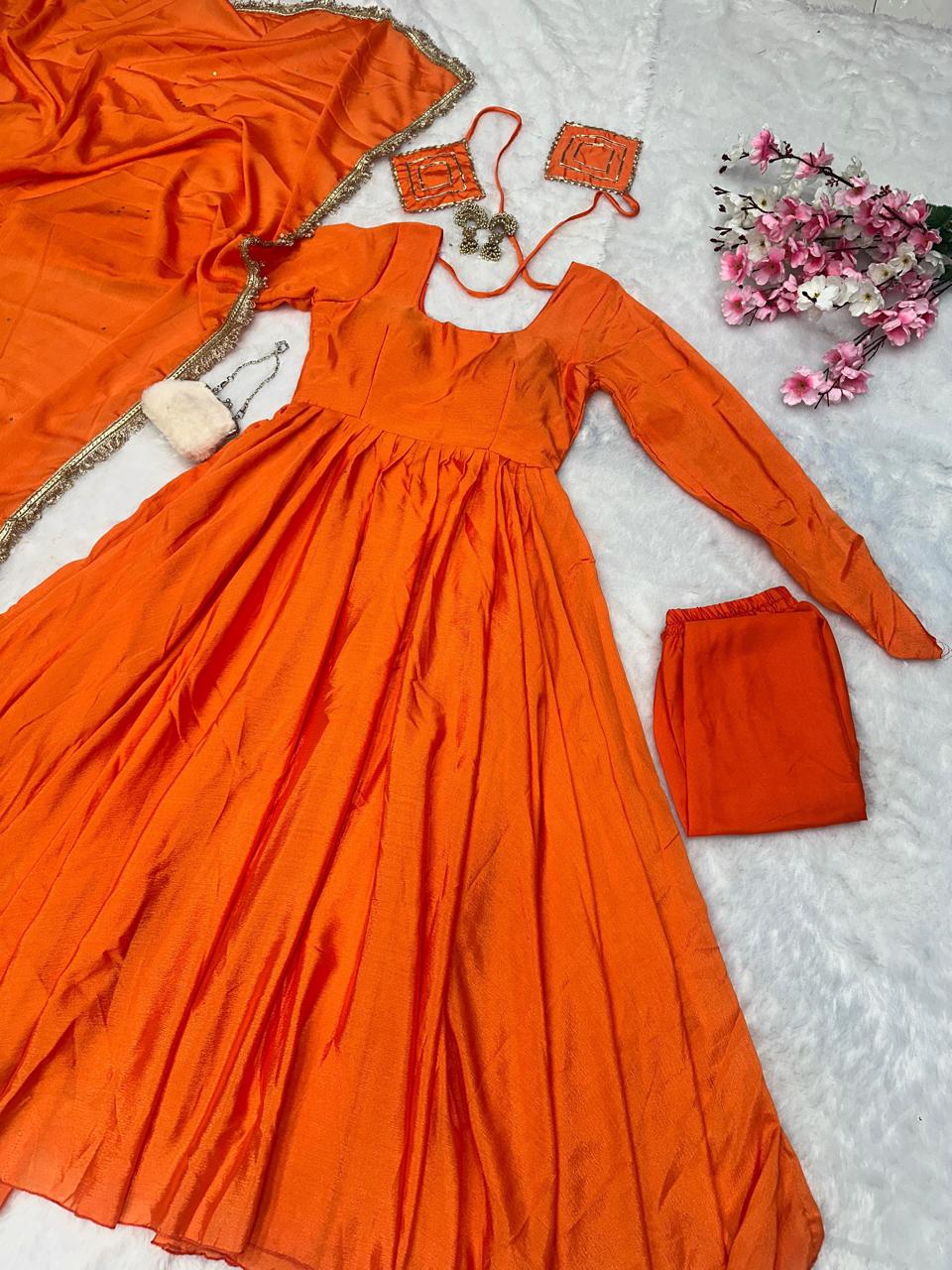 Peaceful Orange Color Chinnon Silk Anarkali Gown