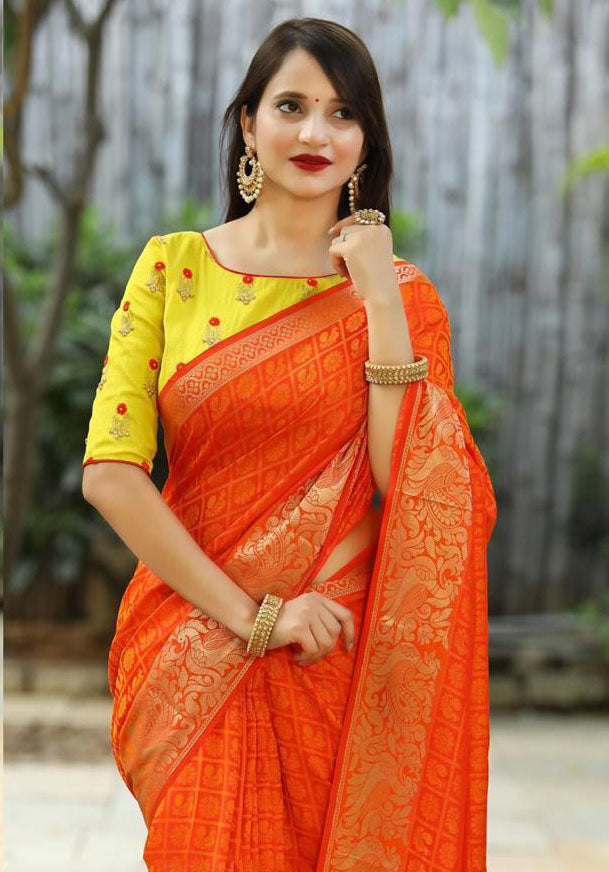 Charming Orange Color Soft Banarasi Silk Saree With Yellow Blouse
