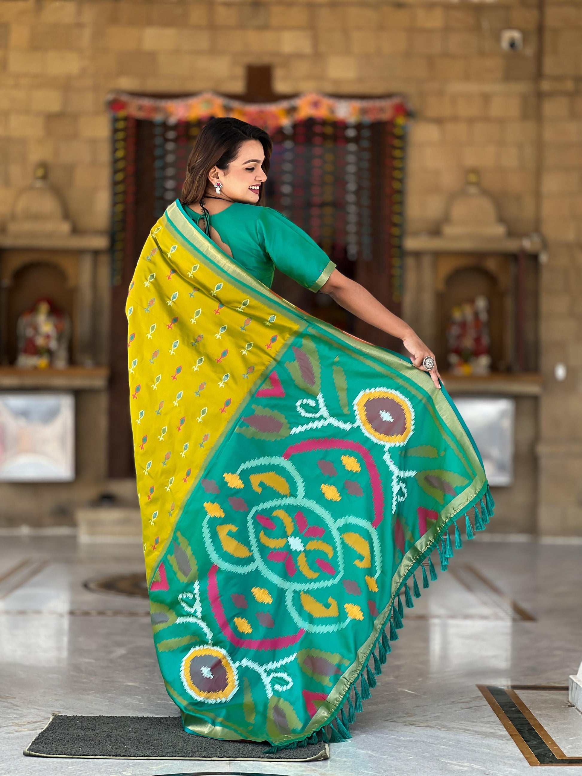 Mehndi Color Patola Weaving Border Silk Saree