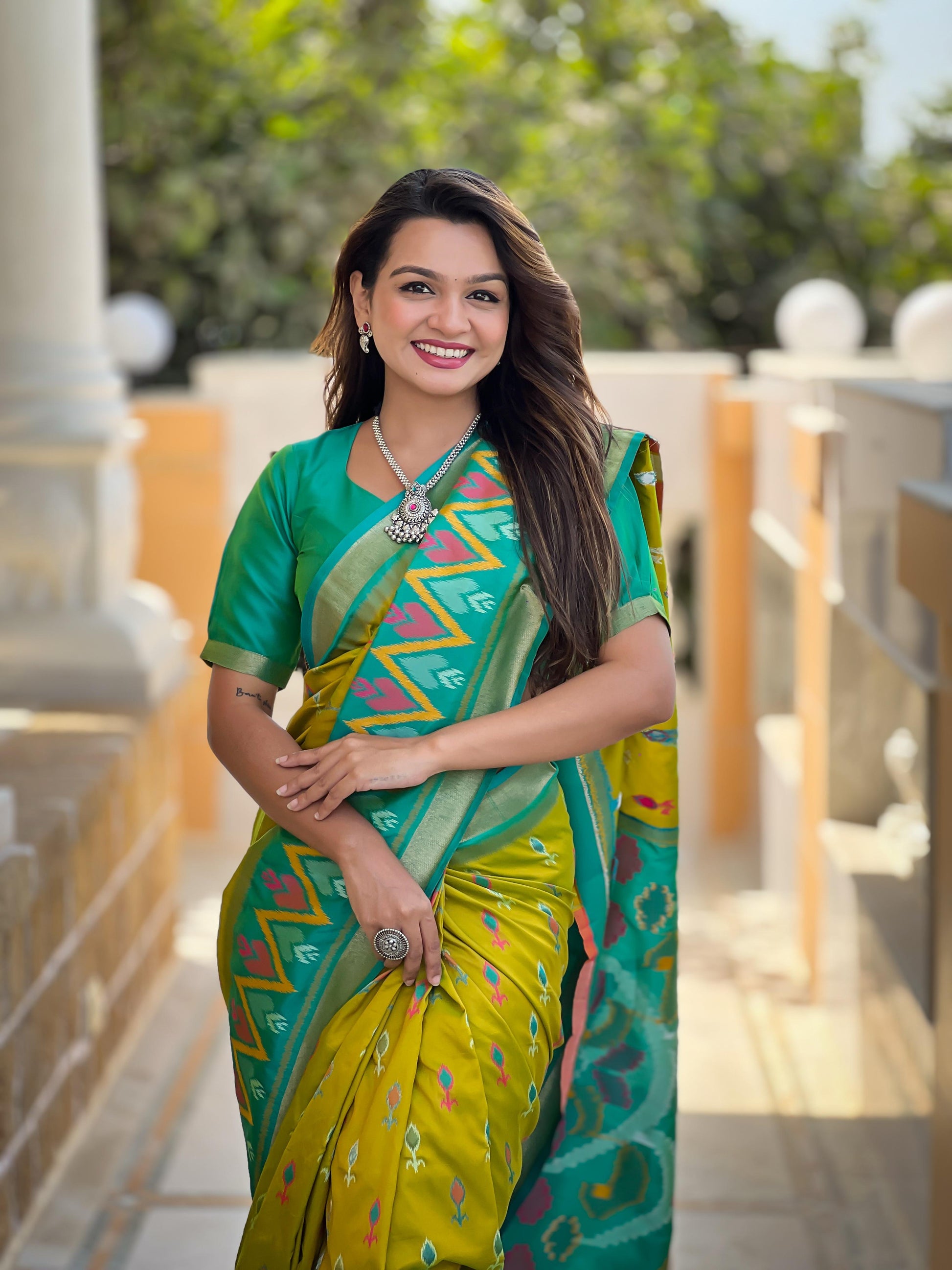 Mehndi Color Patola Weaving Border Silk Saree