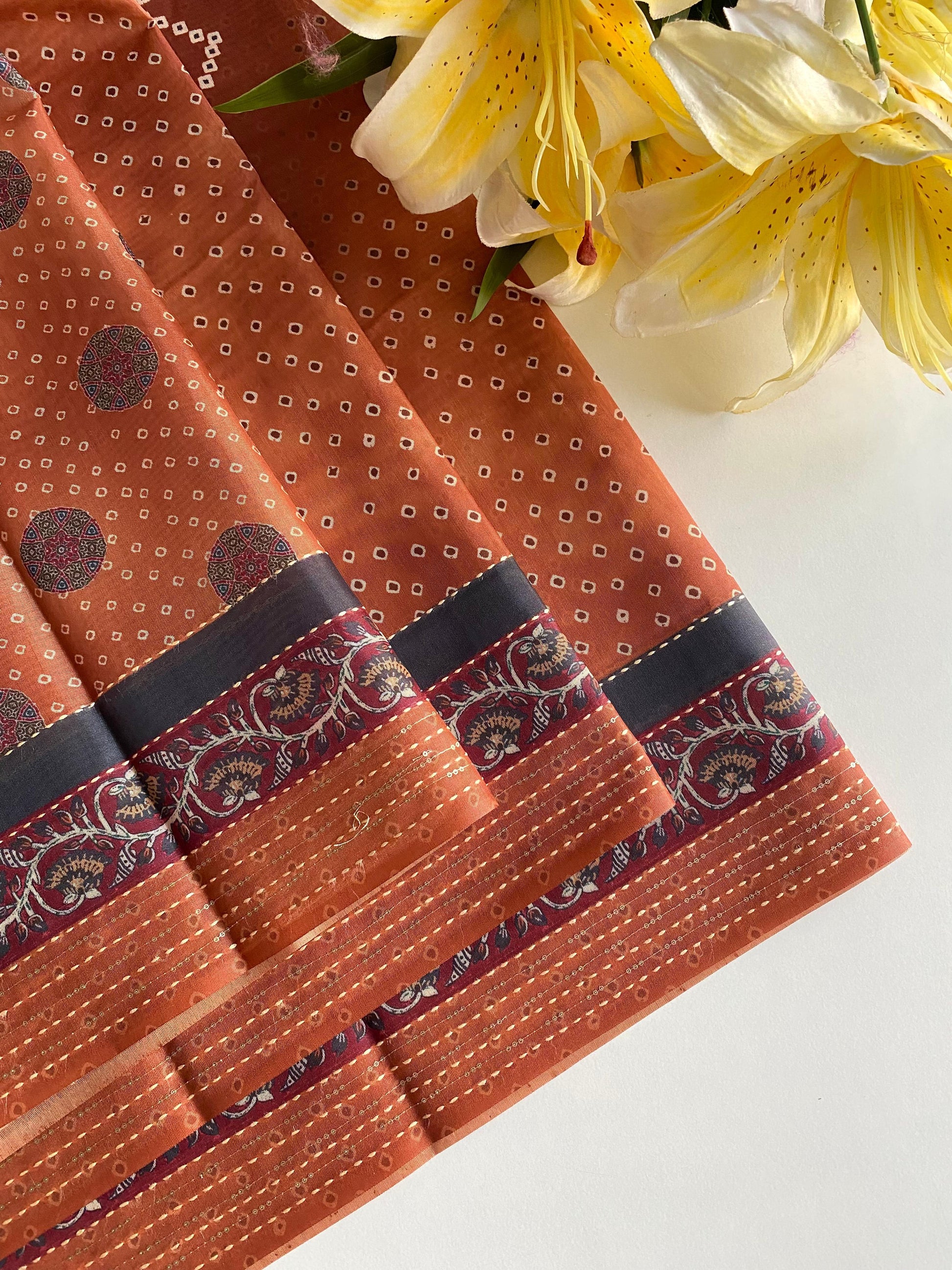 Delightful Bandhani Print With Work Orange Color Saree