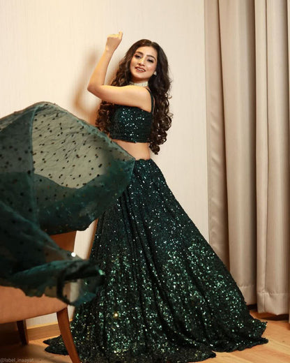 Innovative Dark Green Color Sequence Work Lehenga Choli