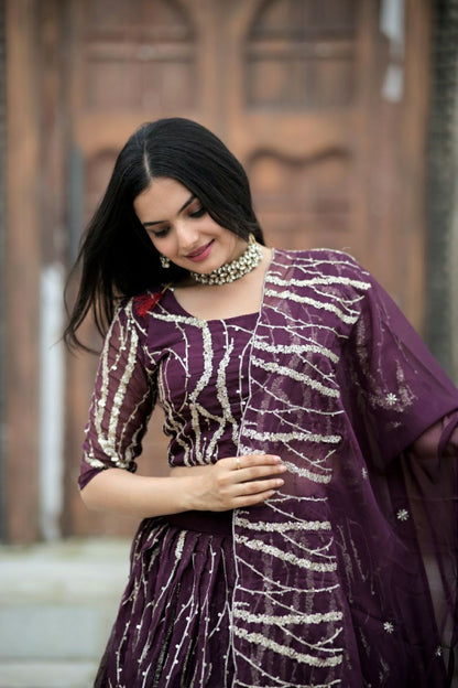 Glimmering Sequence Work Wine Color Lehenga Choli