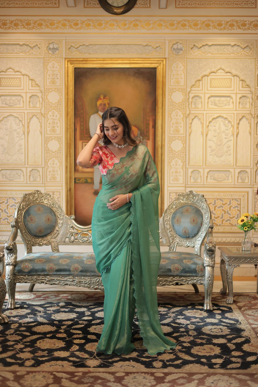 Captivating Cut Work Border Aqua Green Color Saree