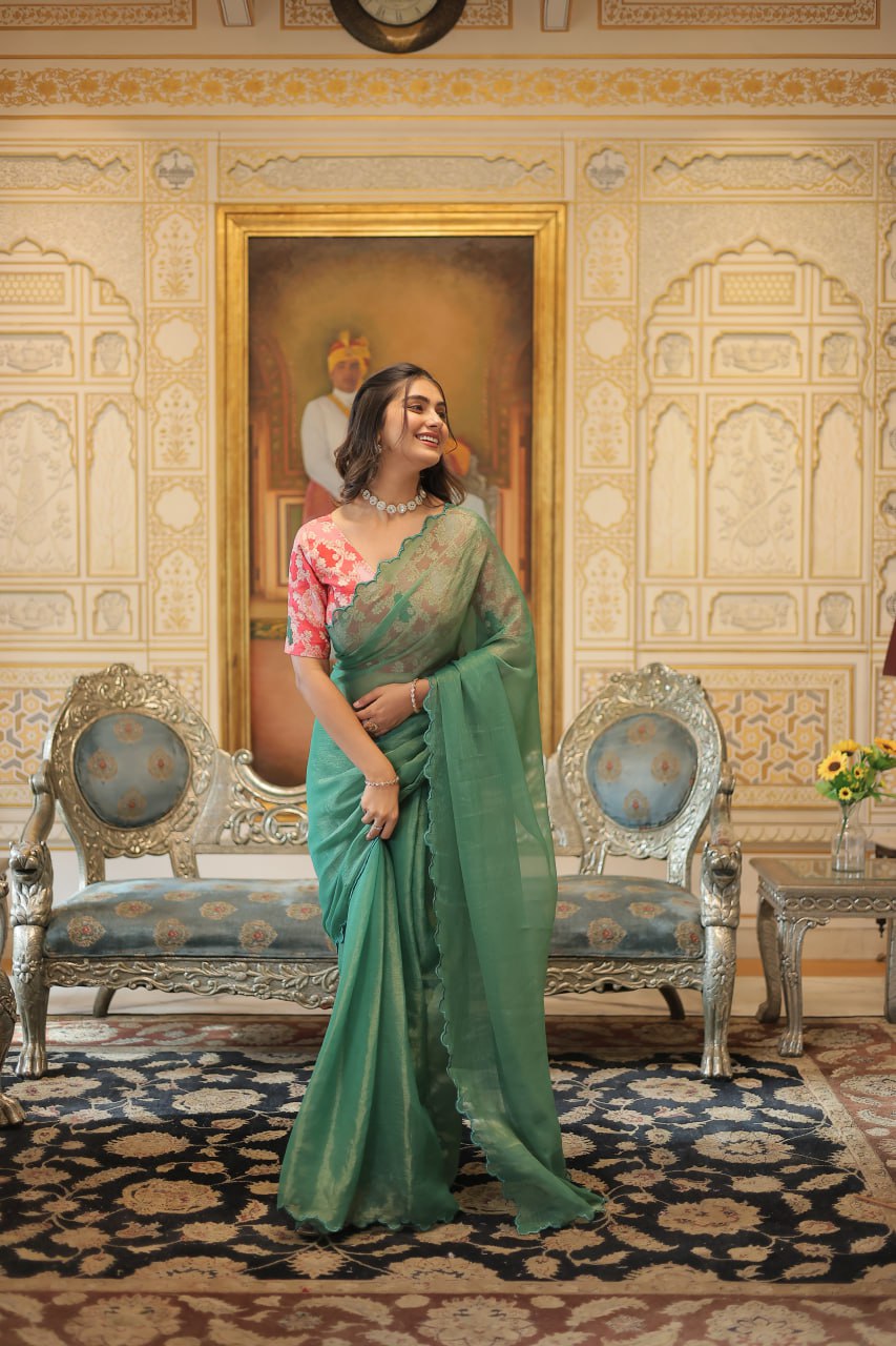 Captivating Cut Work Border Aqua Green Color Saree