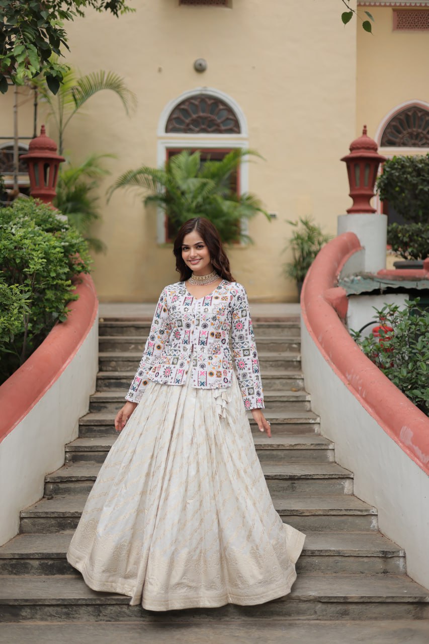 Fabulous Embroidered Work White Color Top With Lehenga