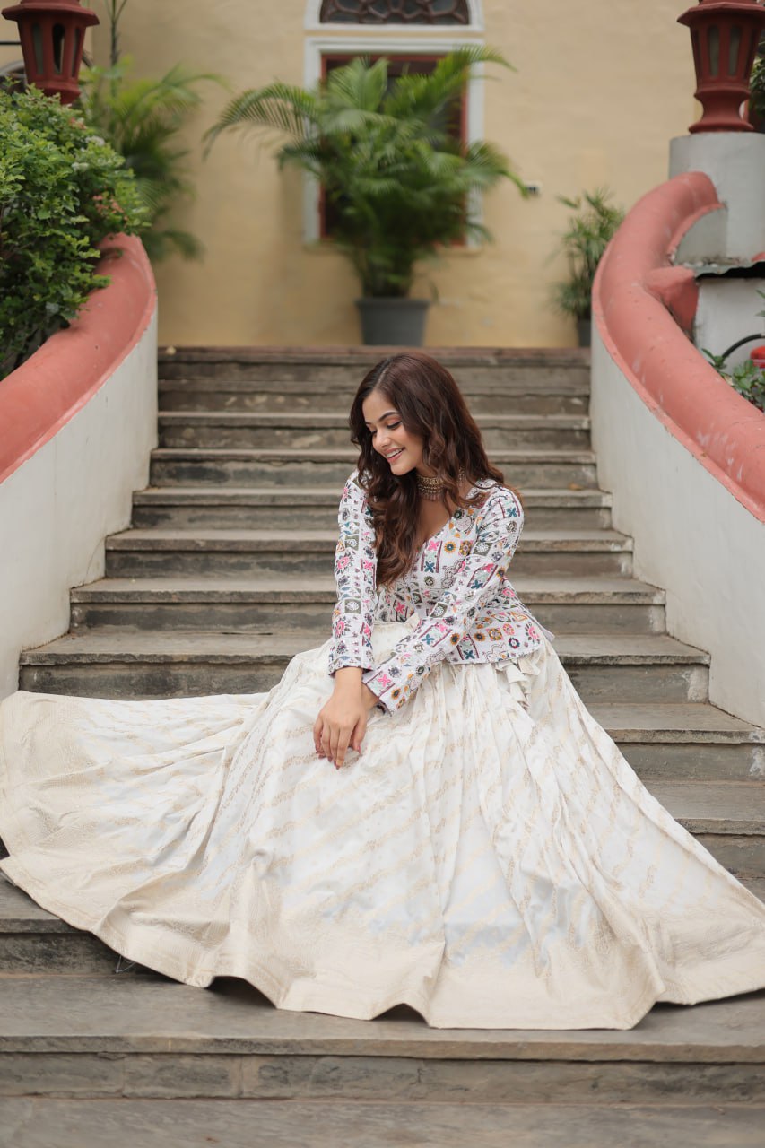 Fabulous Embroidered Work White Color Top With Lehenga