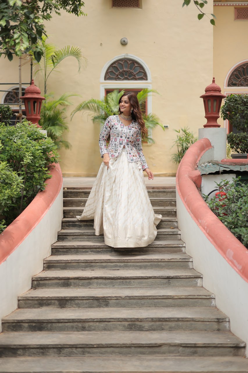 Fabulous Embroidered Work White Color Top With Lehenga
