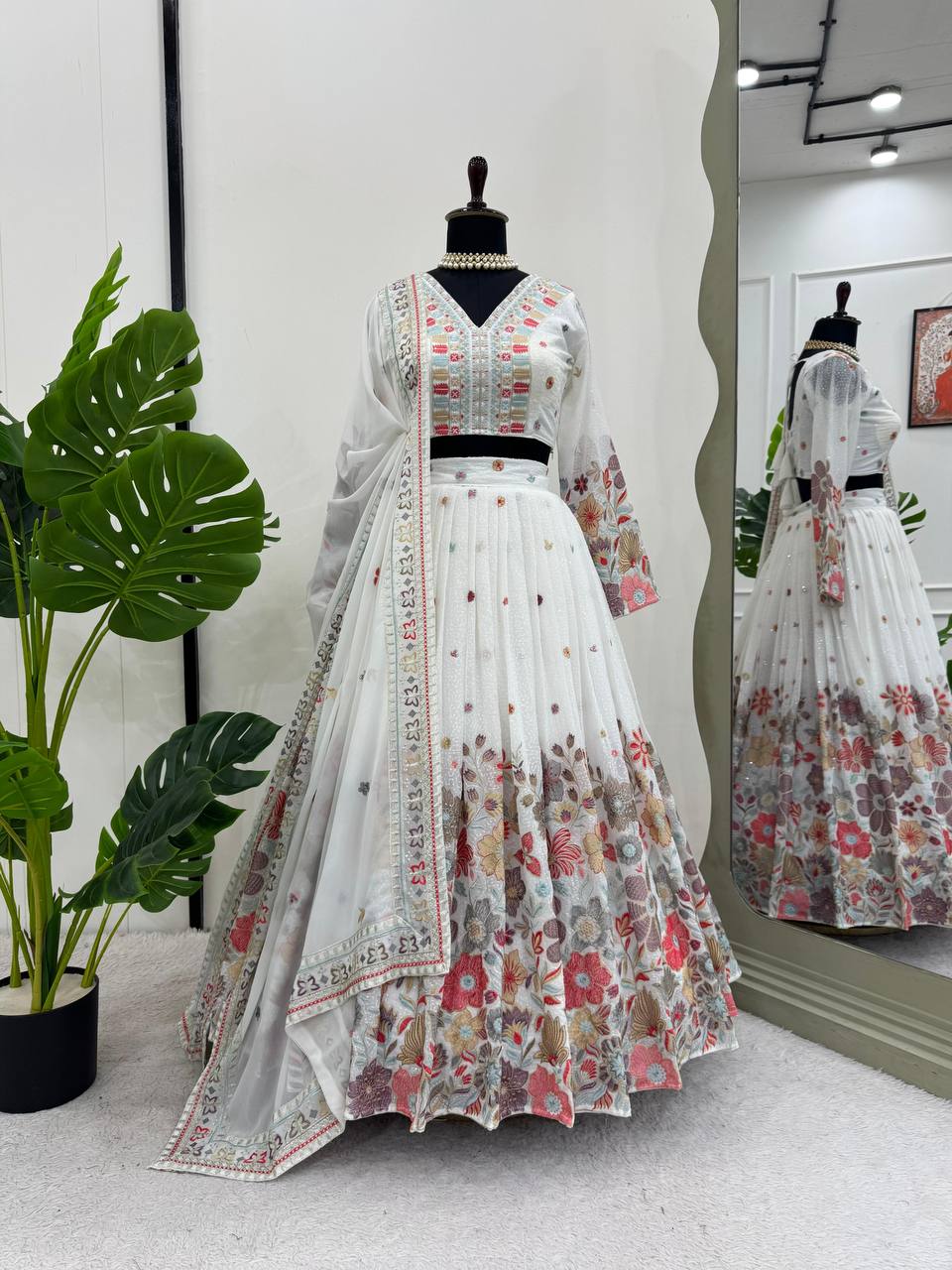 Stunning Pretty Georgette White color Lehenga Choli