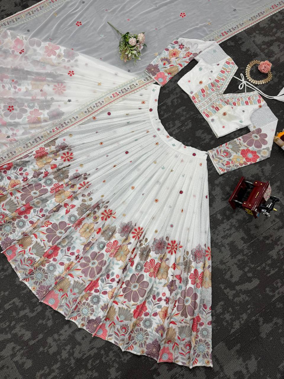 Stunning Pretty Georgette White color Lehenga Choli