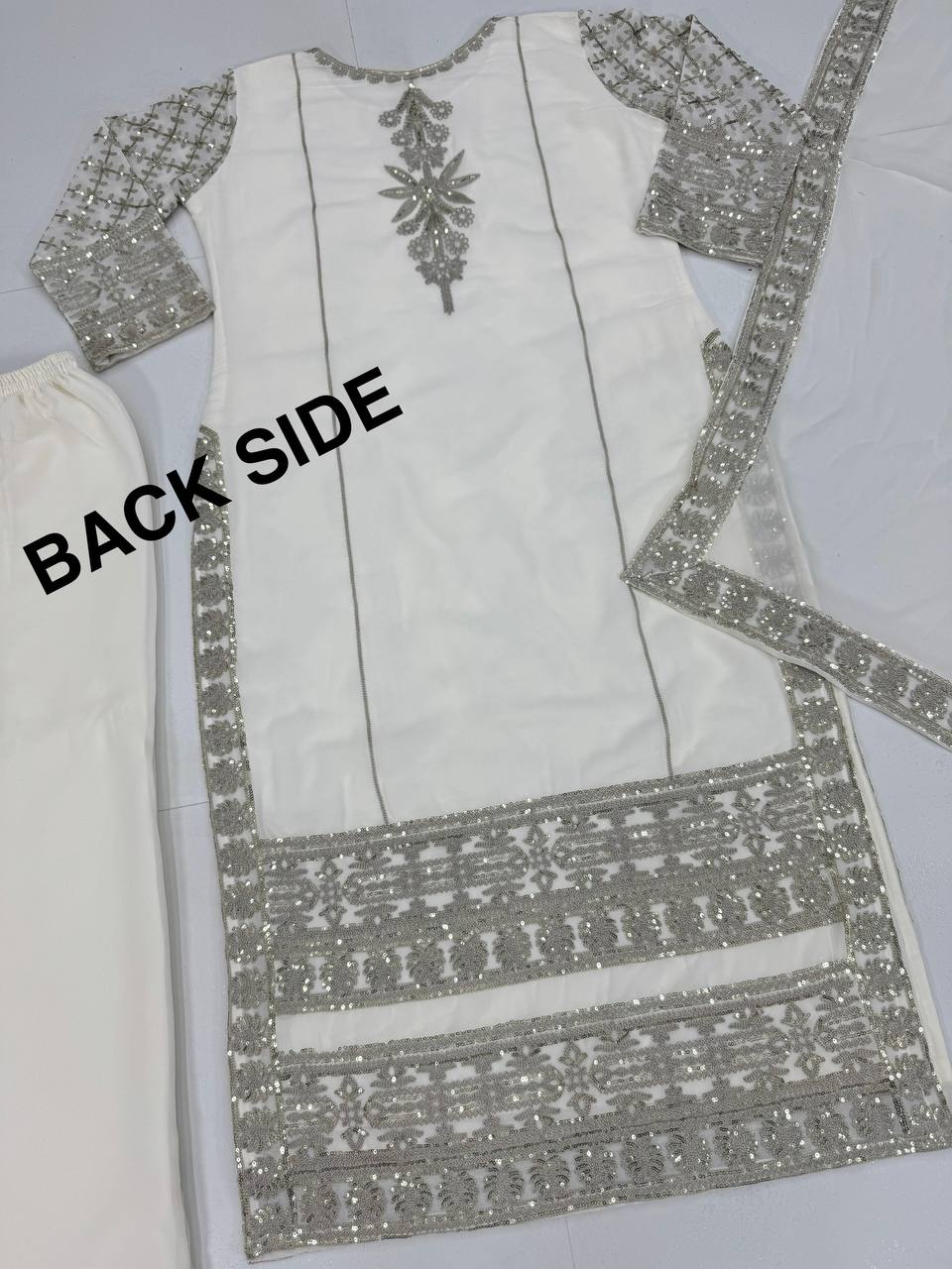 Mesmerizing Embroidery Work White Color Sharara Suit