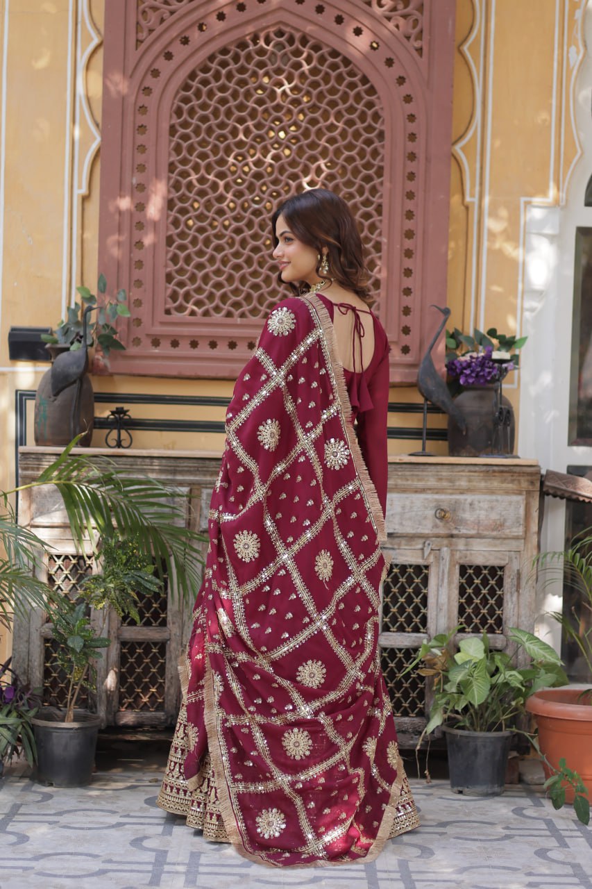 Presenting Embroidery Zari Sequins Work Maroon Color Gown With Dupatta
