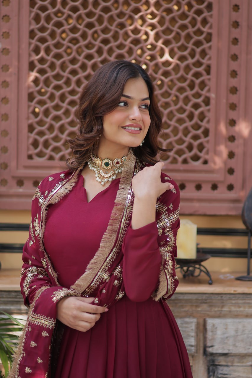 Presenting Embroidery Zari Sequins Work Maroon Color Gown With Dupatta