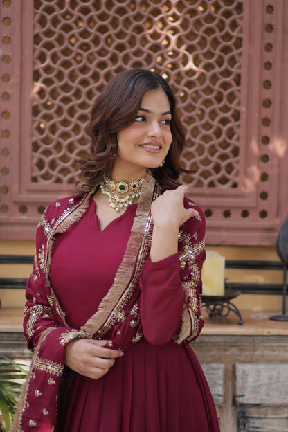 Presenting Embroidery Zari Sequins Work Maroon Color Gown With Dupatta