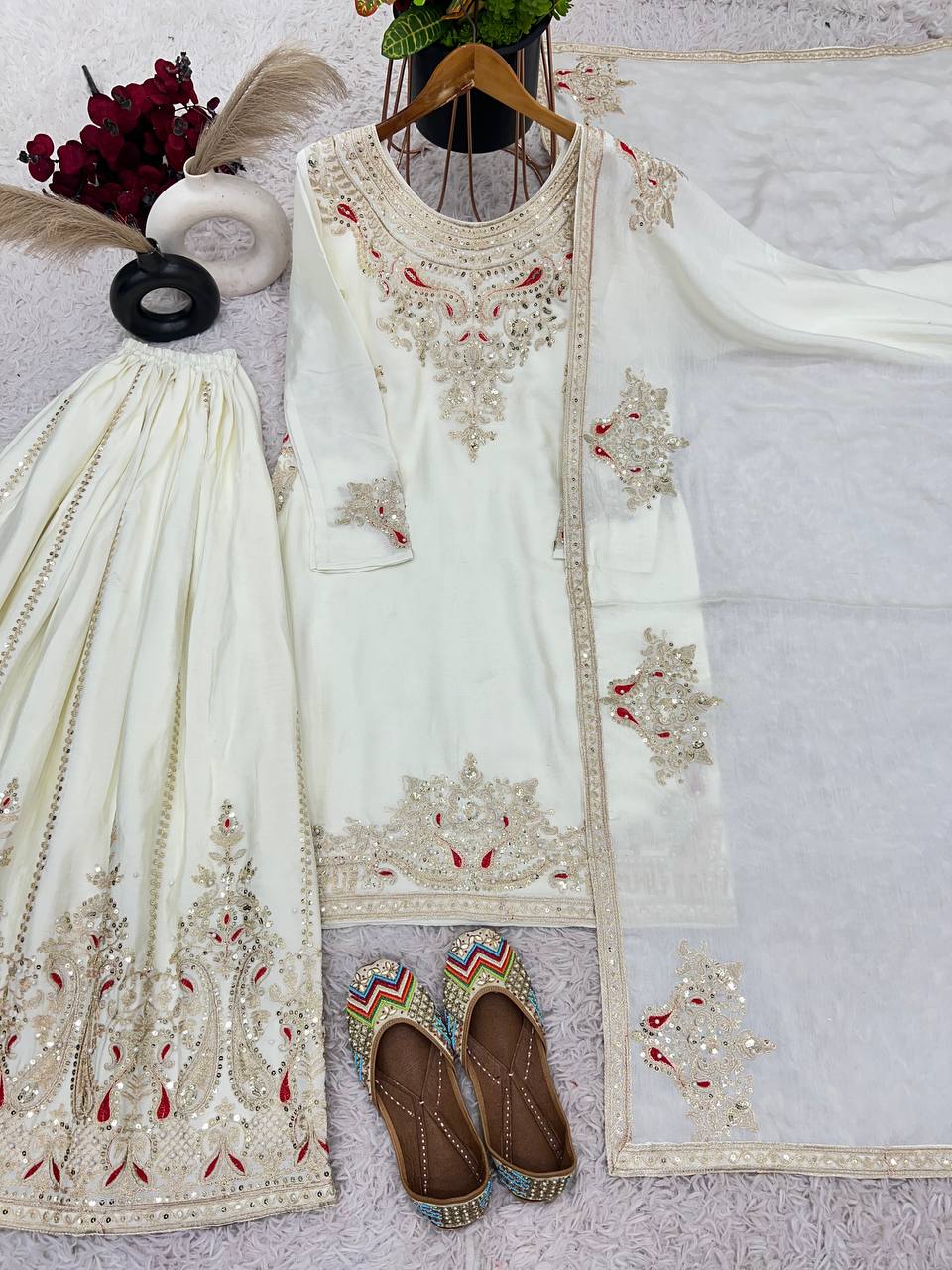 Mesmerizing  Embroidery And Sequence Work White Color Sharara Suit