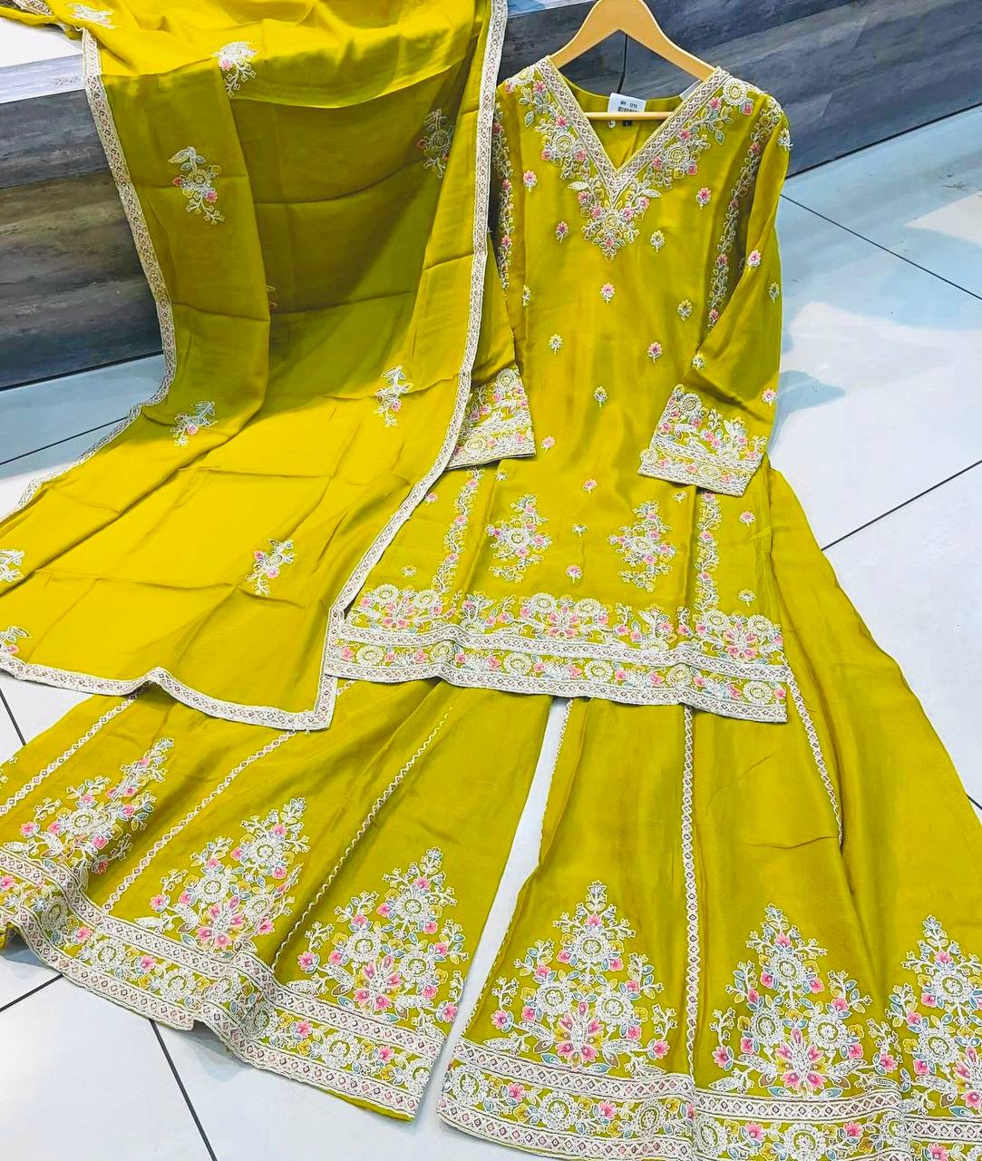 Demanding Embroidery 5mm Work Yellow Color Sharara Suit