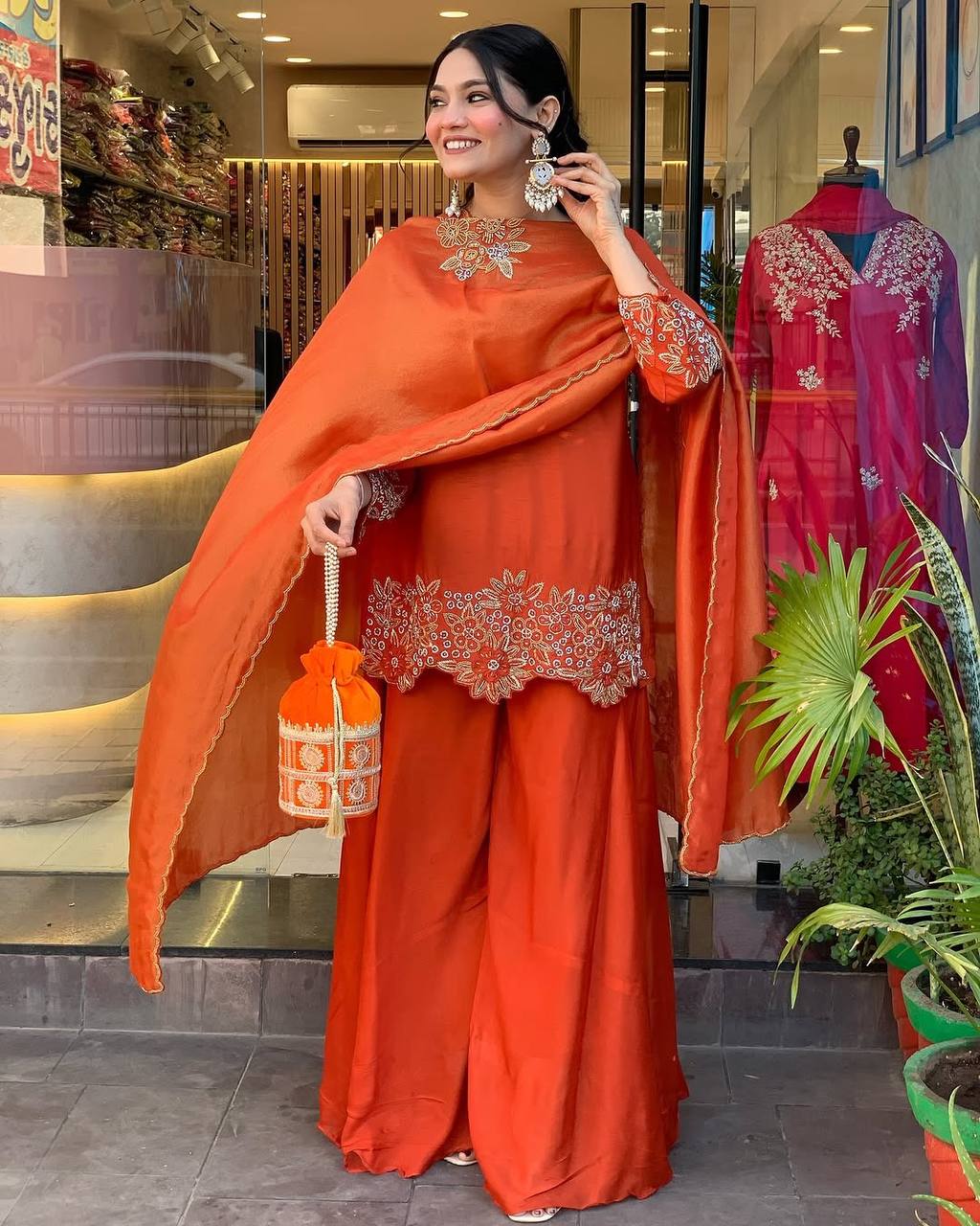 Fantastic Georgette Orange Color Sharara Suit