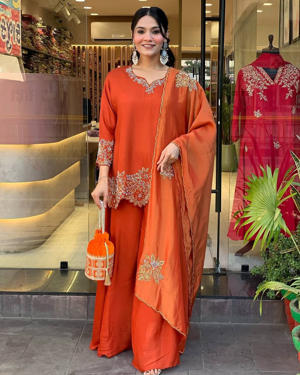 Fantastic Georgette Orange Color Sharara Suit