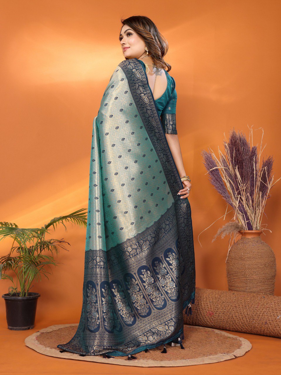 Delightful Tissue Silk Teal Blue Color Saree