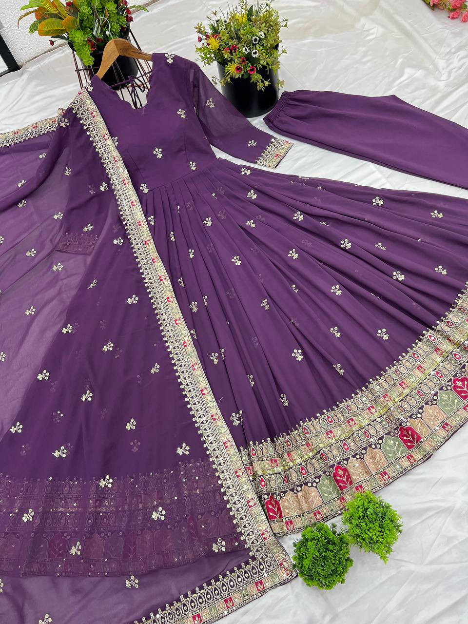 Captivating Georgette Purple Color Gown
