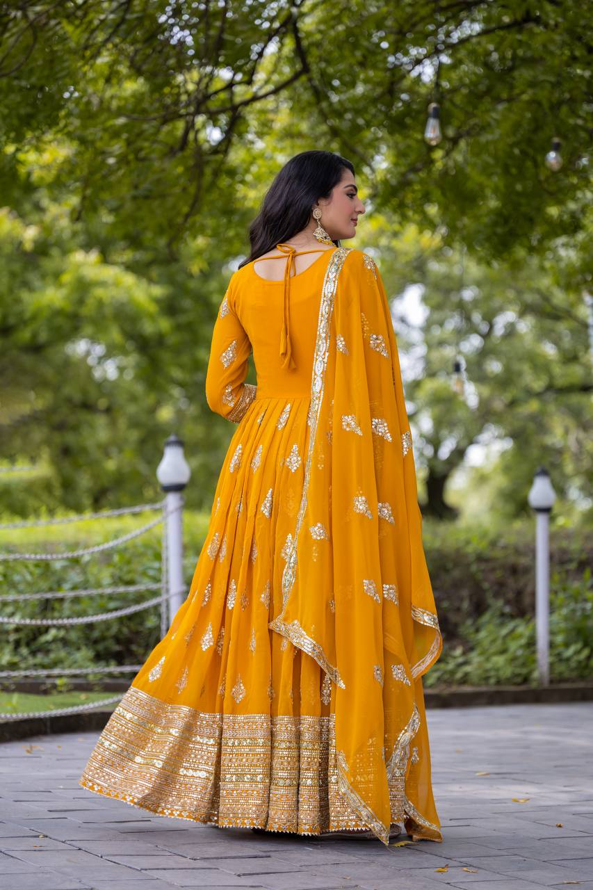 Blissful Sequence Work Yellow Color Gown