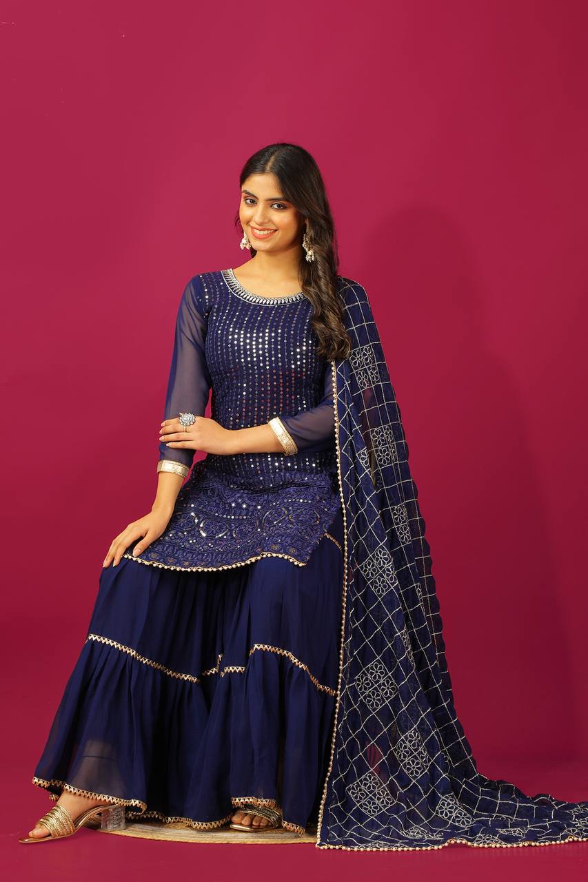 Fashionable Georgette Blue Color Sharara Suit