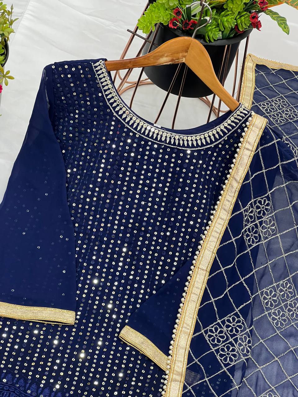 Fashionable Georgette Blue Color Sharara Suit