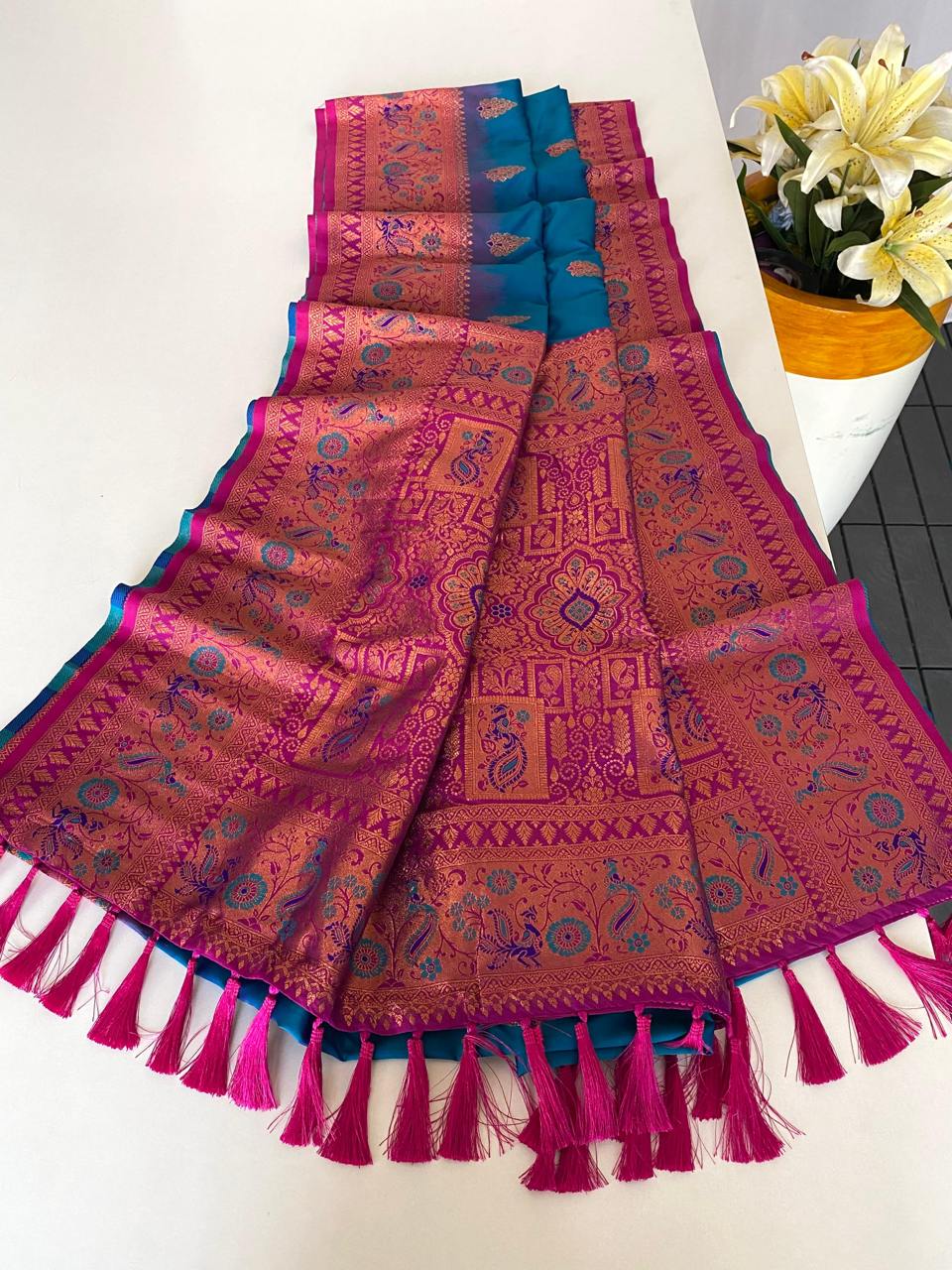 Ravishing Paithani Silk Sky Blue Color Zari Weaves Saree