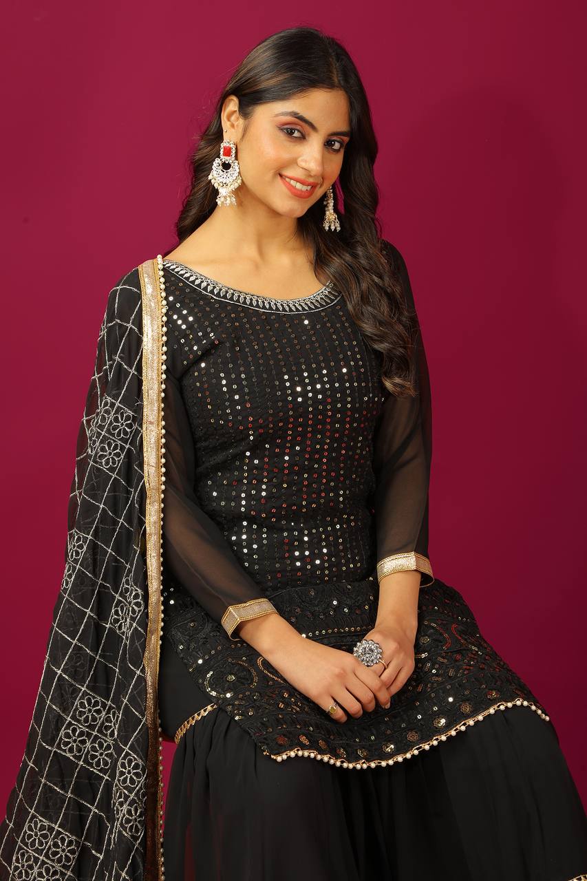 Fashionable Georgette Black Color Sharara Suit